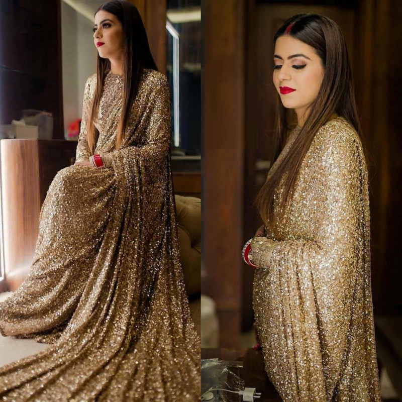New Latest Heavy Sequence Work Golden Color Wedding Wear Saree A rich pallu with heavy sequin work will look gorgeous.
