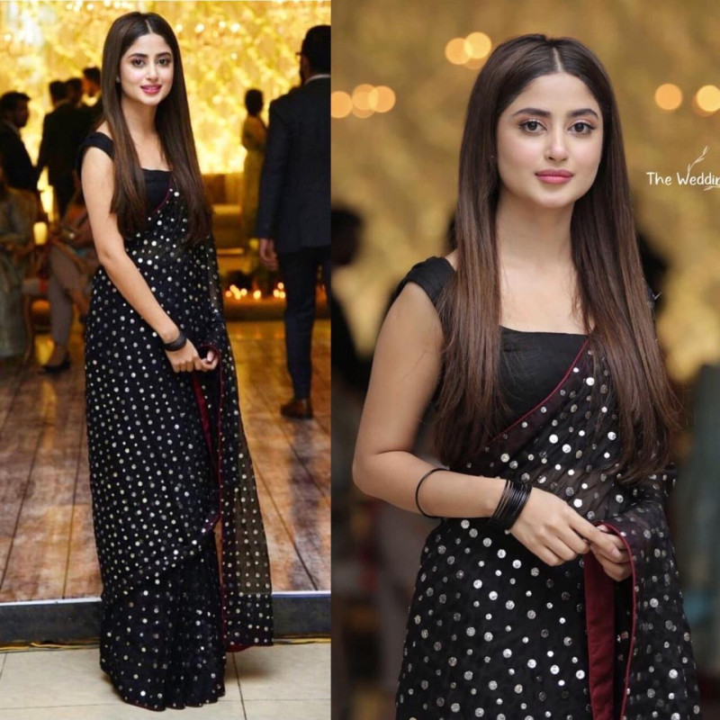 Glowing Black Designer Sequin Saree Vastraqueen What marketing strategies does vastraqueen use? glowing black designer sequin saree