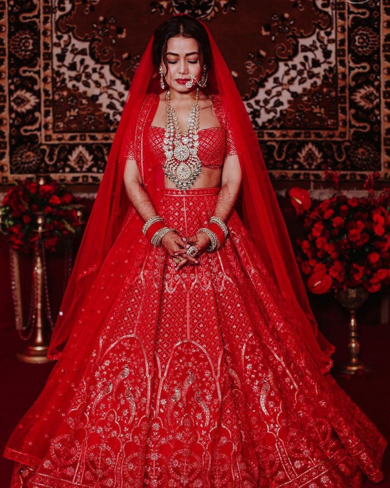 Latest Neha Kakkar Wear Red Wedding Lehenga Choli Vastraqueen