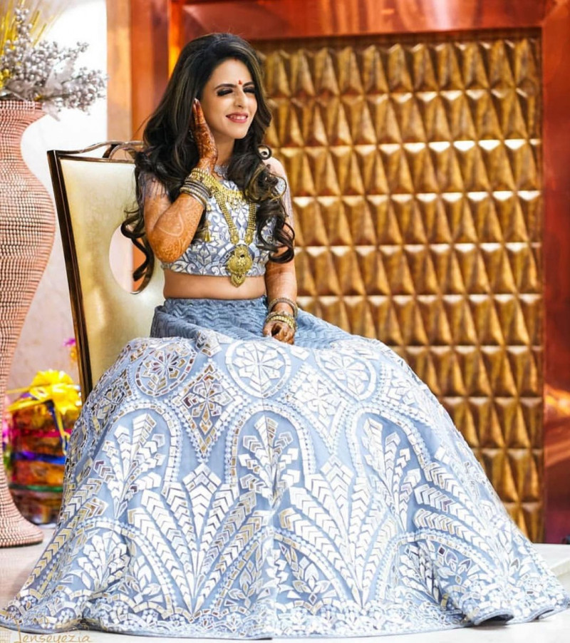 Long Flared Sky Blue Designer Lehenga Choli For Reception Vastraqueen Buy online womens wear exclusive sarees, exclusive salwar kameez, designer lehengas, exclusive kurtis in india. long flared sky blue designer lehenga