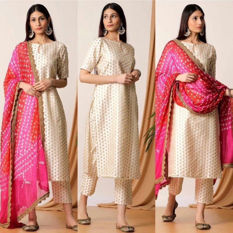 off white suit with pink dupatta